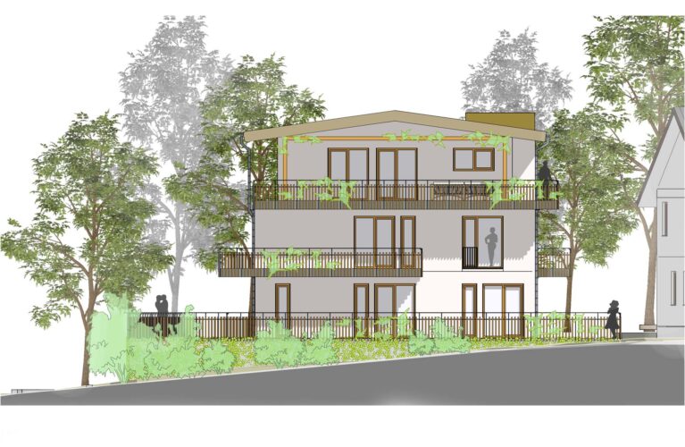 Südansicht des modernen Mehrfamilienwohnhauses in Burgstetten mit großzügigen Balkonen, begrünten Fassaden und harmonischer Einbindung in die umgebende Hanglage.